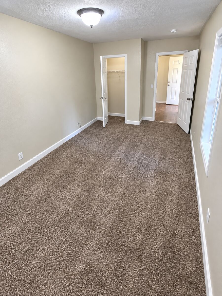 Bedroom doors in a 1-bedroom apartment at Canterbury Station